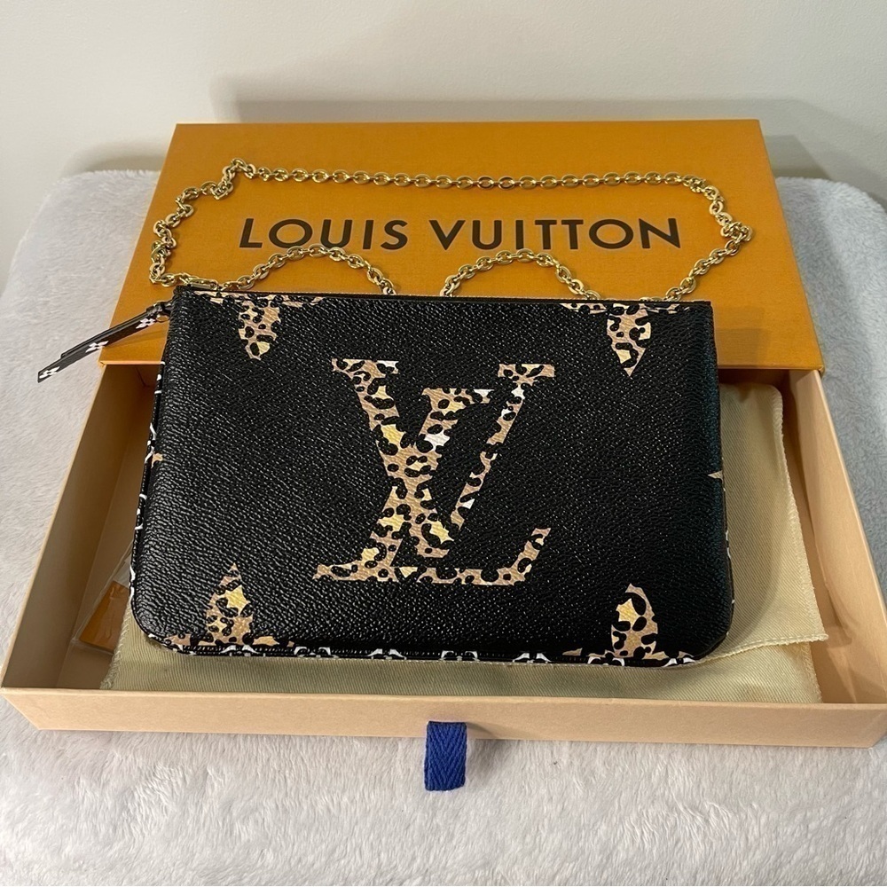 Authentic Louis Vuitton jungle monogram double pochette